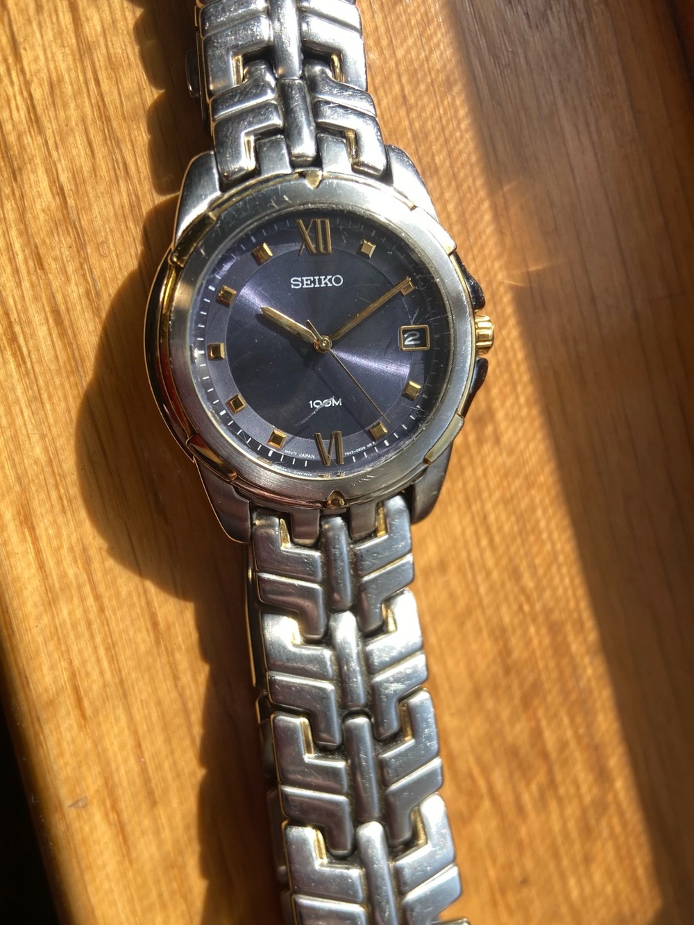 Seiko 7n42-0am0 Two-Tone Silver and Gold Men’s Watch with Blue Dial